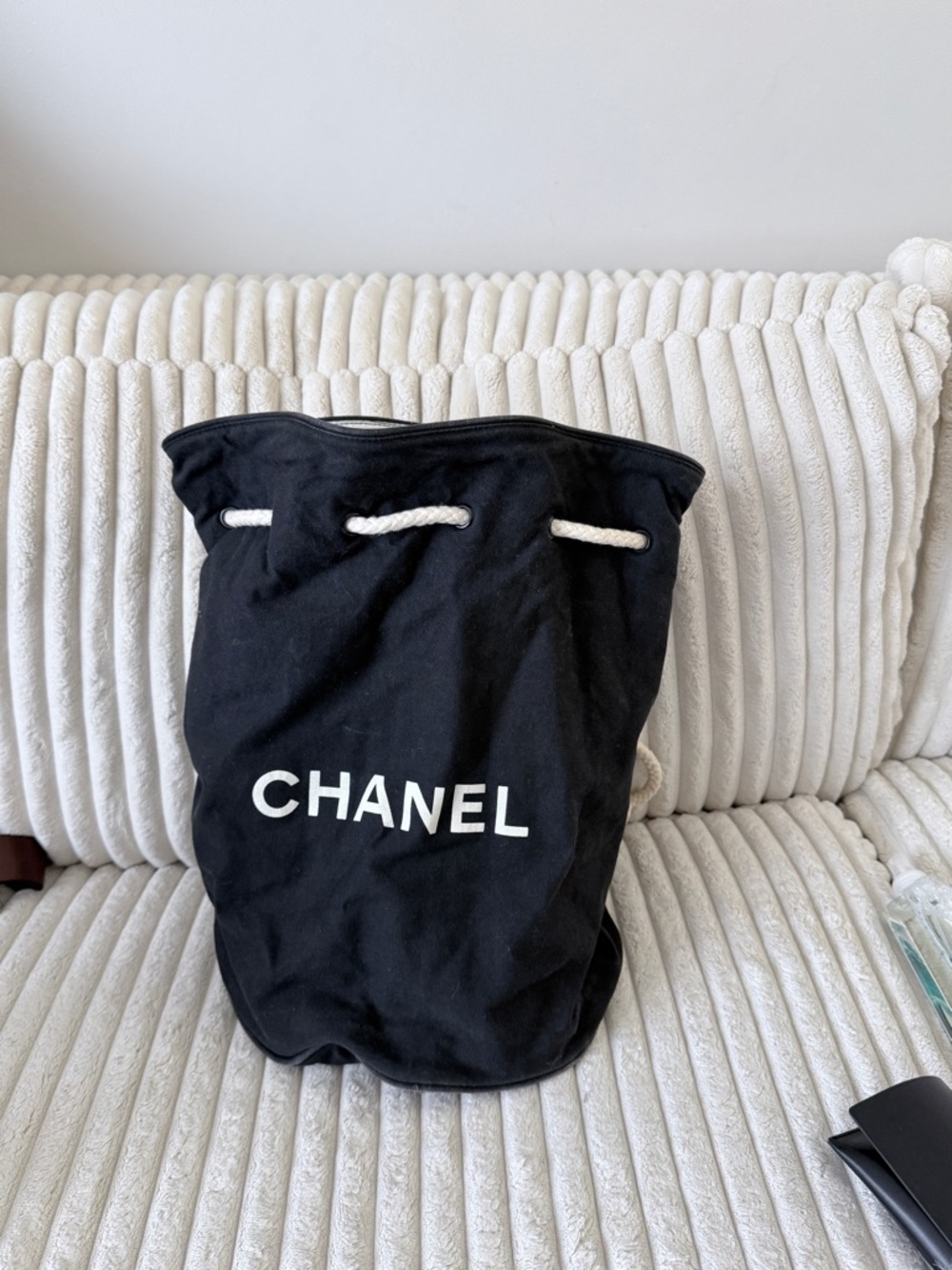 CHANEL Black Canvas Bucket Bag with White Rope Trim